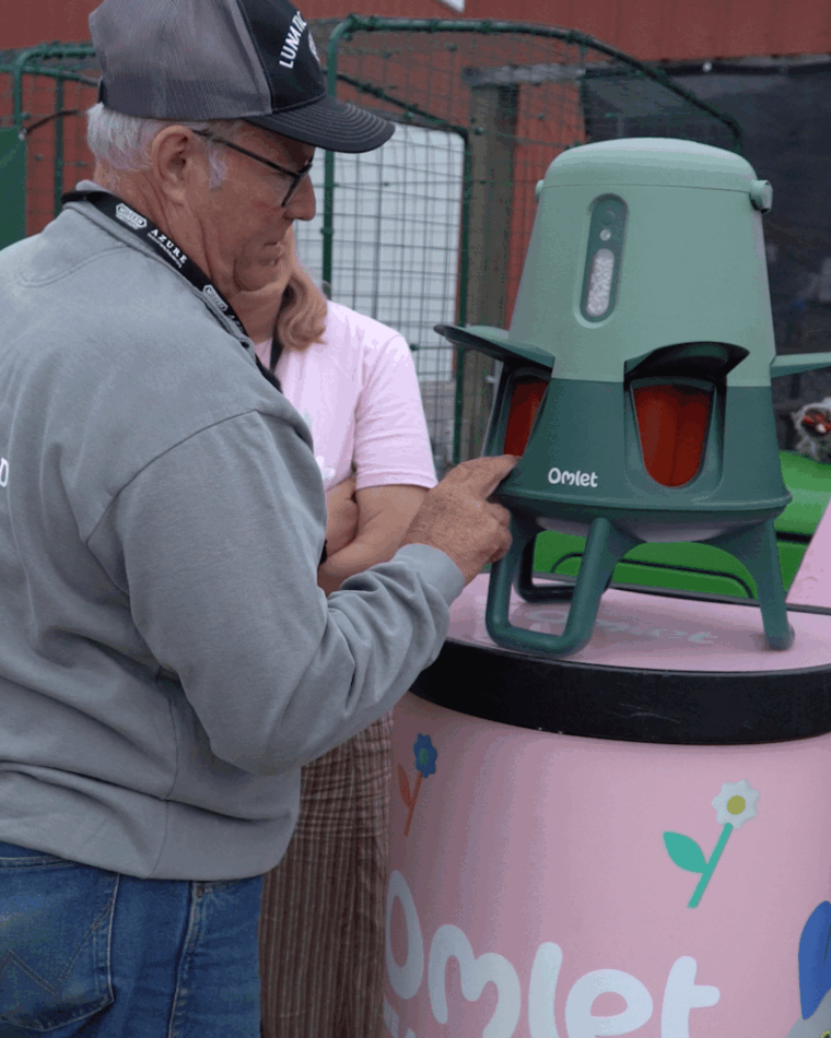 Joel Salatin with the Omlet Smart No Waste Feeder