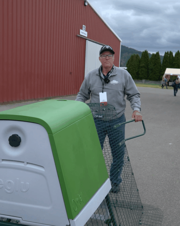 Joel Salatin moving an Eglu Go Up 
